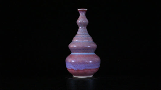 Kore Soteira ornate pink bottle